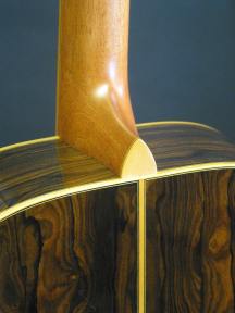 Satin lacquer finish on the neck with boxwood heel cap.