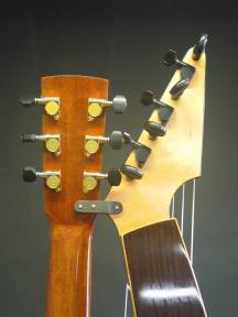 The sub basses are tuned with 2 types of tuners. 16:1 geared viola Peghed tuners are alternated with Gotoh mini tuners to allow more access to the knobs. A small bracket joins the 2 pegheads