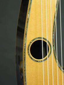 The second soundhole on the arm.