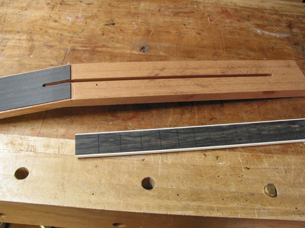Mahogany neck blank has the truss rod slot and is ready to be cut to shape.