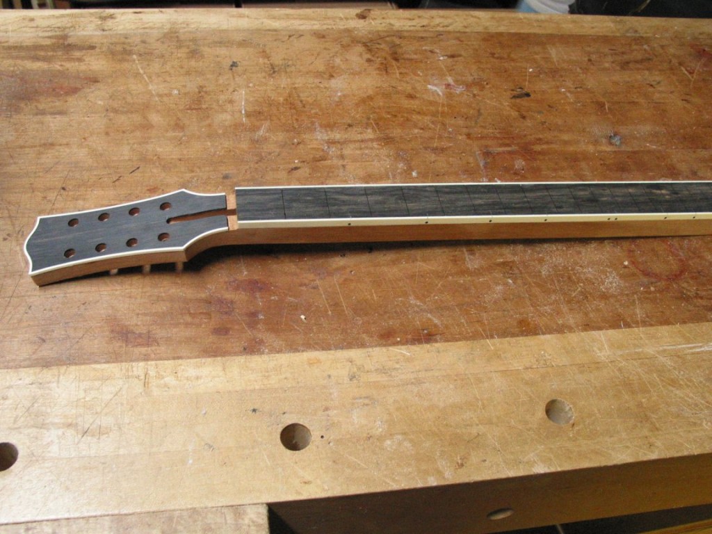 The neck and fingerboard ready for inlay.